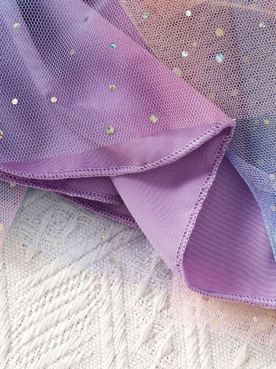 Baby tulle dress with sequin details and layered skirt in purple and pink ombre.
