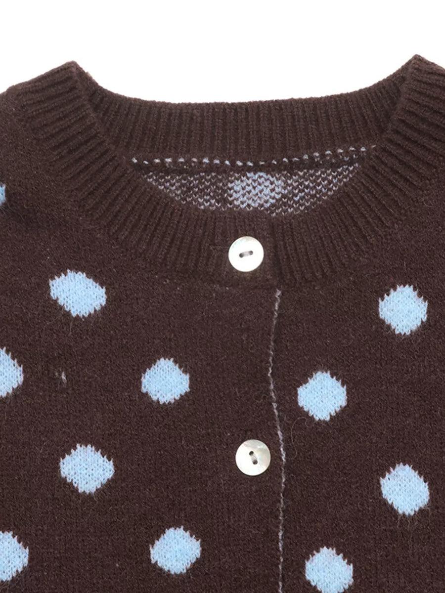 light blue cardigan with button-front and polka dot