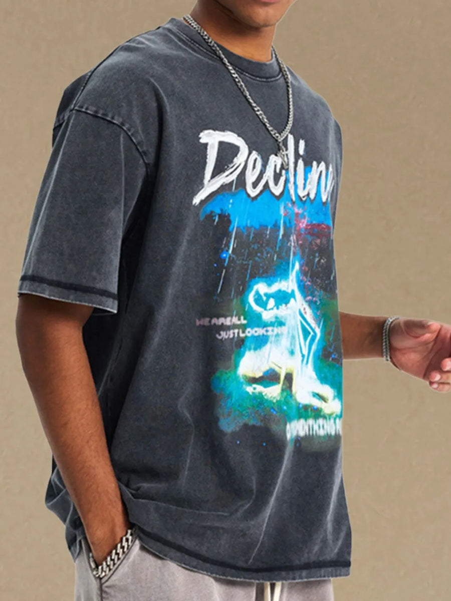 GraphiSleeve acid-washed black crew neck t-shirt with graphic print.