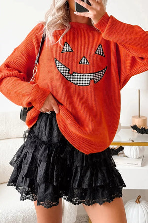 Orange pullover sweater with hip-length and pullover