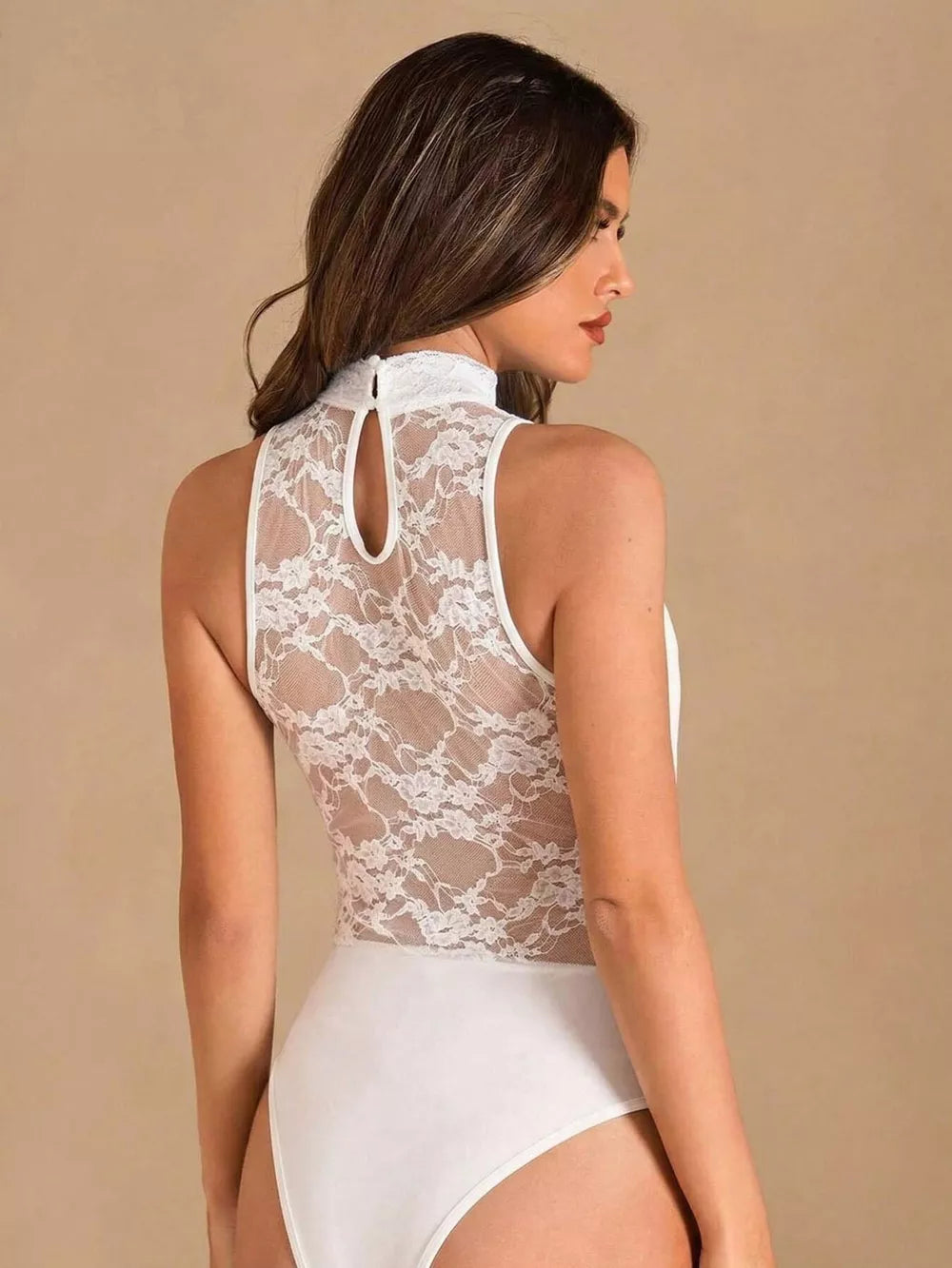 White lace-trimmed sheer bodysuit with mock neck and keyhole back detail
