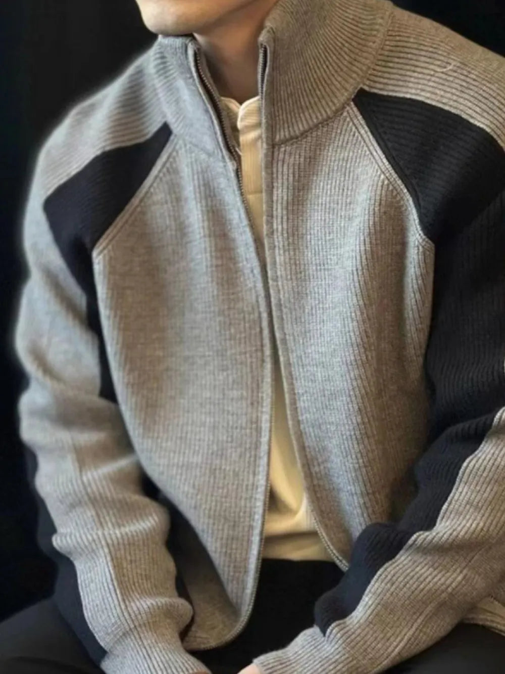 Gray ribbed zip-up track jacket with black contrast panels and stand-up collar