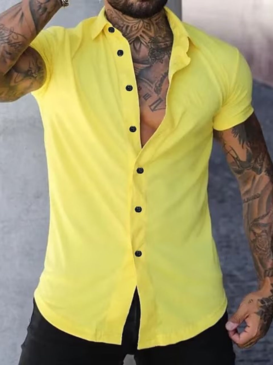 Men's yellow slim fit short sleeve button-down shirt with black buttons.