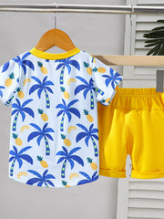 Baby tee and shorts set with tropical palm tree and pineapple print, yellow shorts.