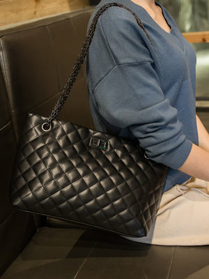 crossbody bag featuring quilted in Black with PU Leather Imported Size &amp texture