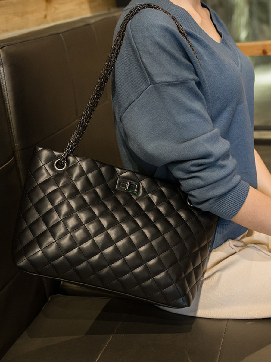 crossbody bag featuring quilted in Black with PU Leather Imported Size &amp texture