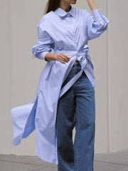 80% Polyester, 20% Cotton Care instructions: Machine wash cold button-down shirt in Blue with relaxed silhouette