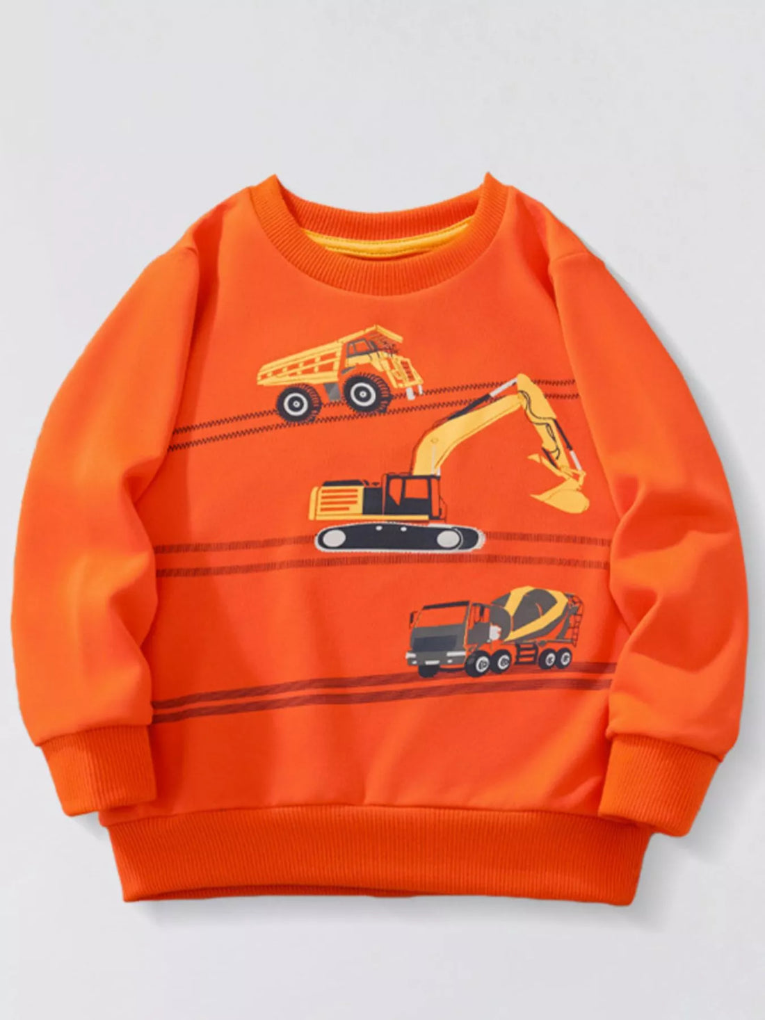 Orange children's sweatshirt with construction vehicles and tire track graphic.