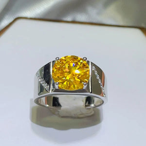 Radiant yellow moissanite ring in sterling silver with diamond accents on band