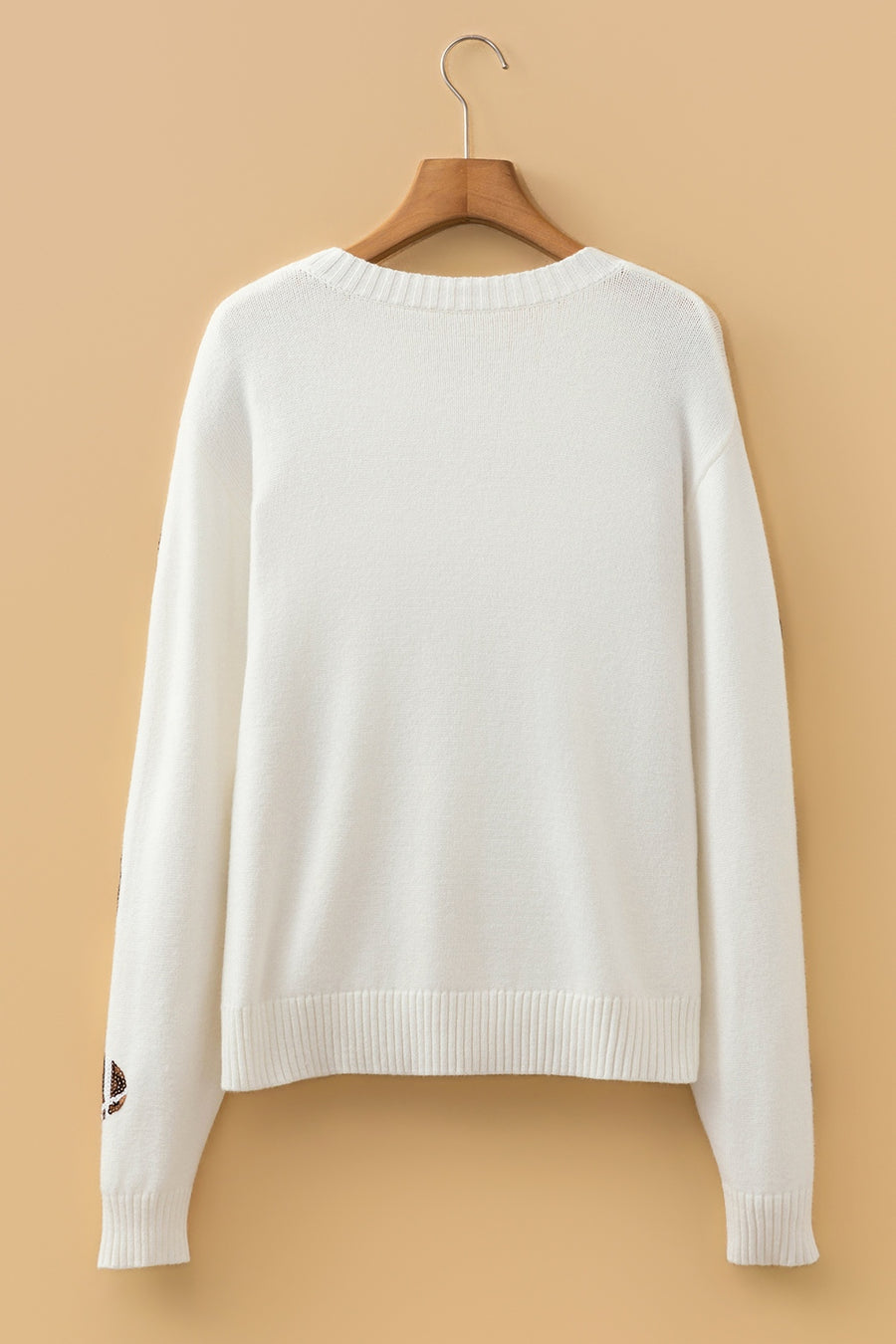pullover sweater featuring novelty print in bronze with 100% polyester Care instructions: Machine wash cold texture