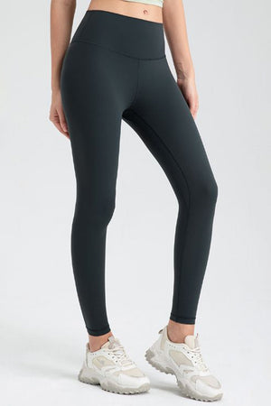 Dark Navy high-waist performance leggings with sculpted seams and a full-length cut.