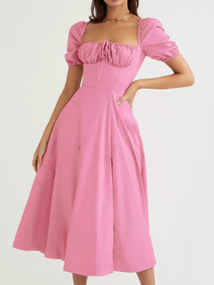Pink puff sleeve tie front midi dress with square neckline and flared skirt.