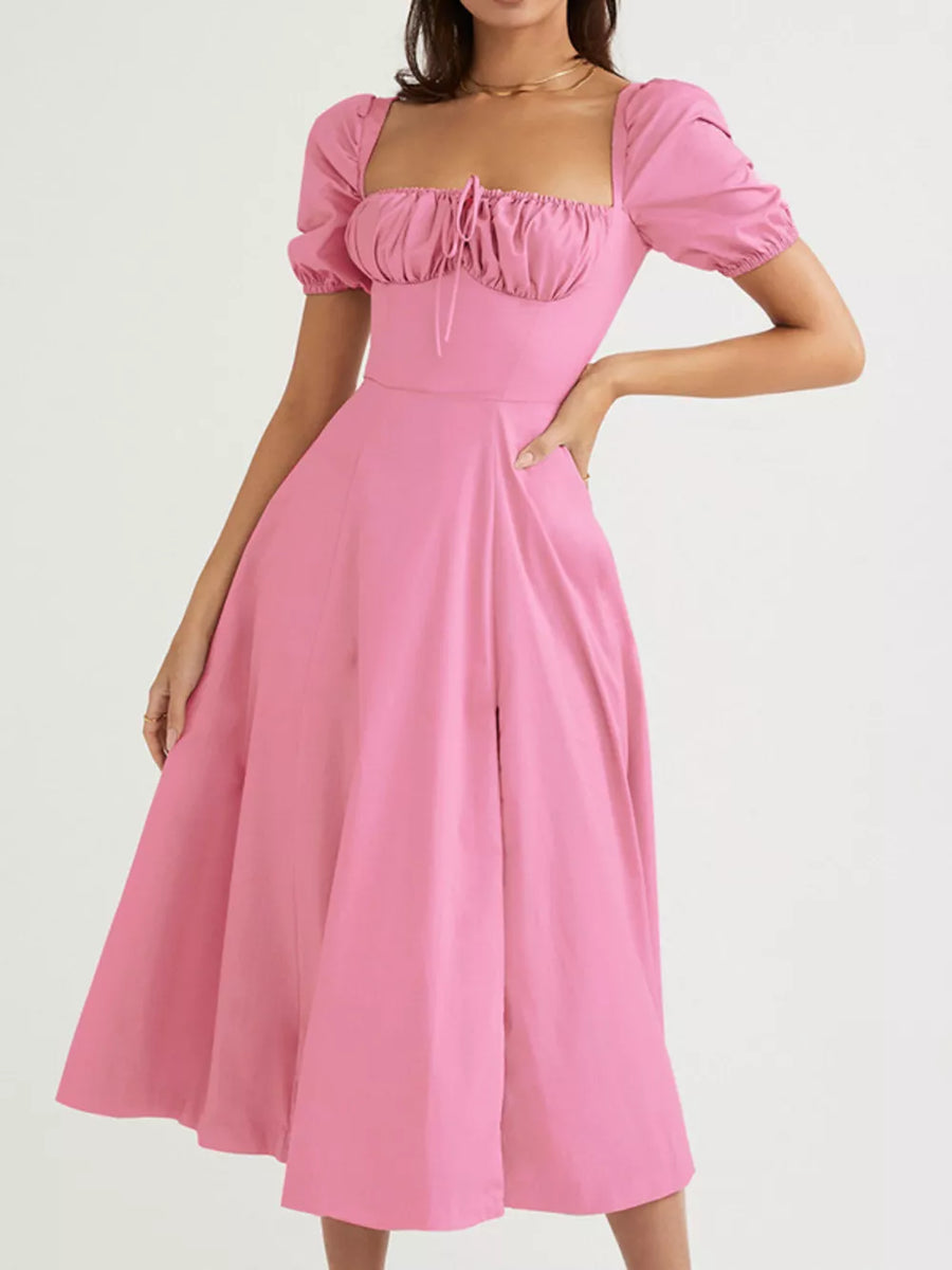 Pink puff sleeve tie front midi dress with square neckline and flared skirt.