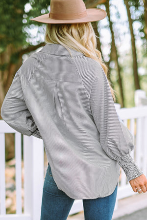 Mid Gray pinstripe blouse with balloon sleeves and smocked cuffs.