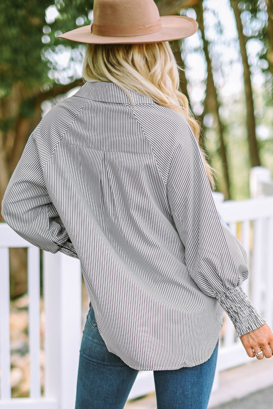 Mid Gray pinstripe blouse with balloon sleeves and smocked cuffs.