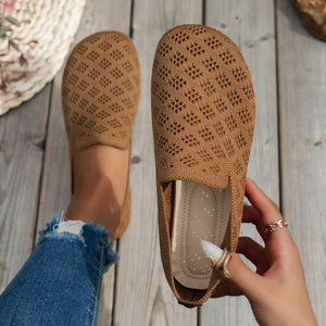Tan diamond knit loafers flats with a breathable perforated pattern.