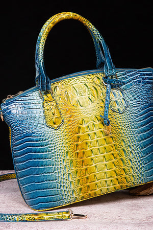 Exotic Crocodile Satchel bag in yellow/blue gradient with embossed texture and top handles.