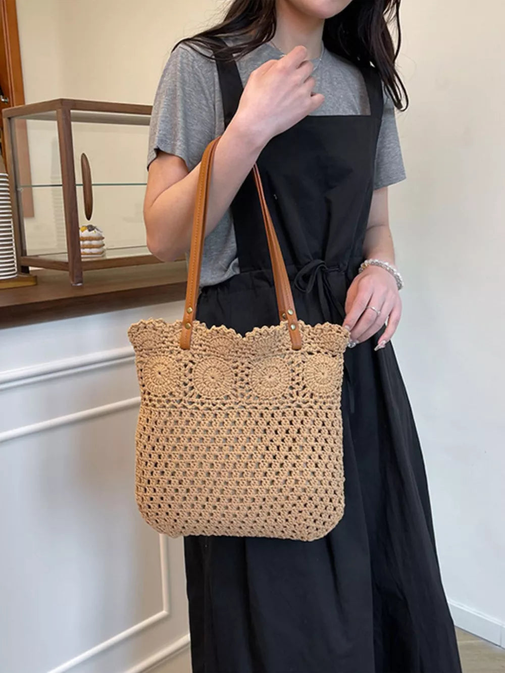 Khaki tote featuring crochet knit and crochet