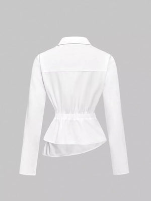 White asymmetrical button front long-sleeve shirt with cinched waist and peplum hem