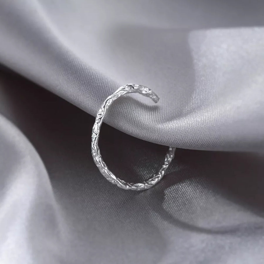 Gray ring featuring textured and textured