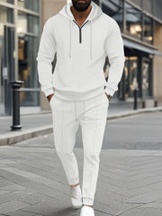 White textured quarter-zip hoodie and matching joggers set for men.