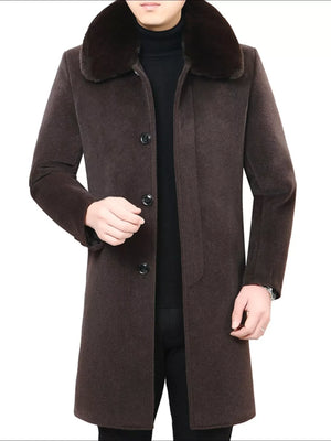 Men's brown buttoned overcoat with a luxurious fur collar.