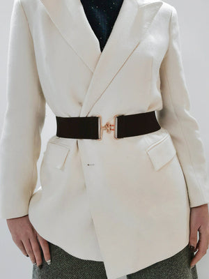 Black elastic waist belt with sculpted gold buckle detail