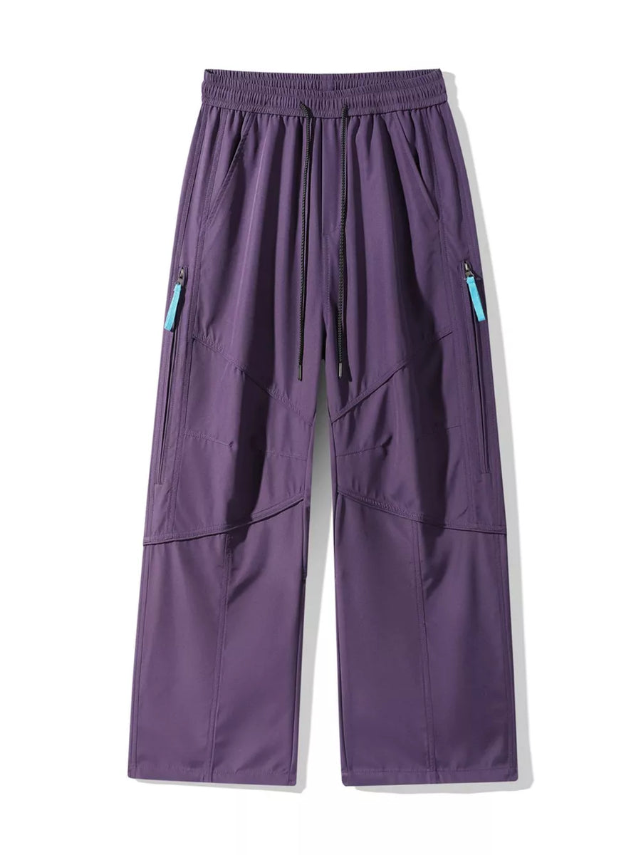 Purple men's cargo pants with drawstring waist and zippered pockets.