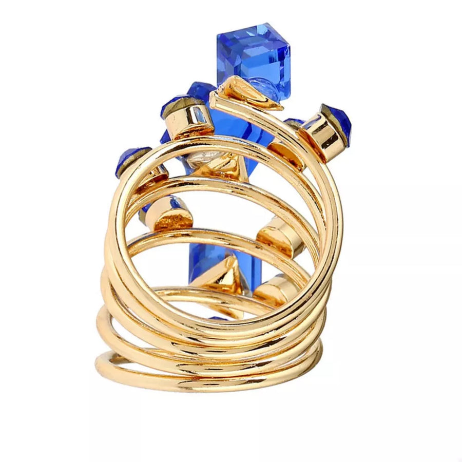 Gold-plated multi-layered ring with royal blue crystals and a spiral design.