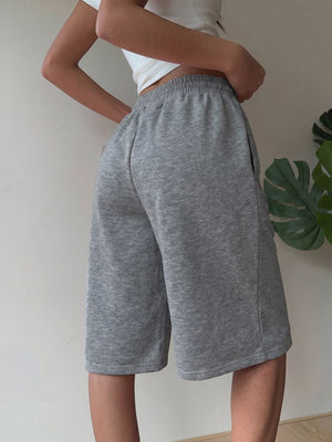 bermuda shorts in heather grey with drawstring waist and bermuda