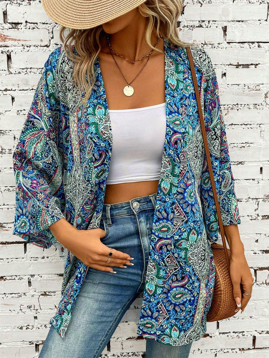Paisley print kimono sleeve duster in teal with open front and 3/4 sleeves.