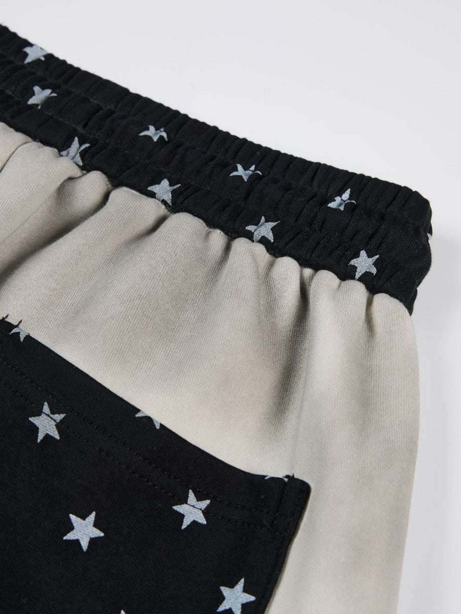 wide-leg pants featuring baroque print | script print | star print in Eggshell with 95%polyester,5%spandex Care