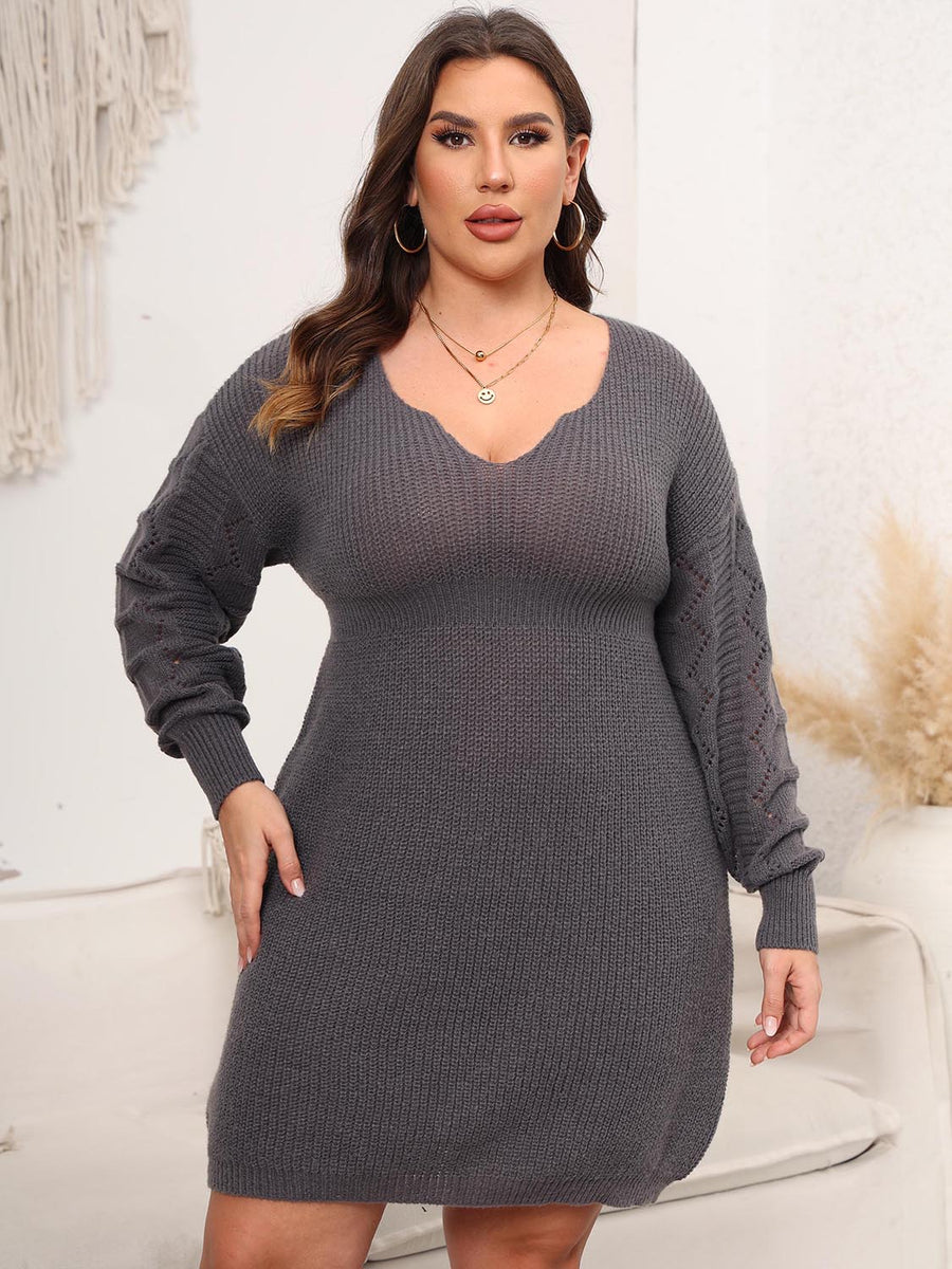 Sculpted knit midi dress in charcoal with V-neck and diamond detail on sleeves.