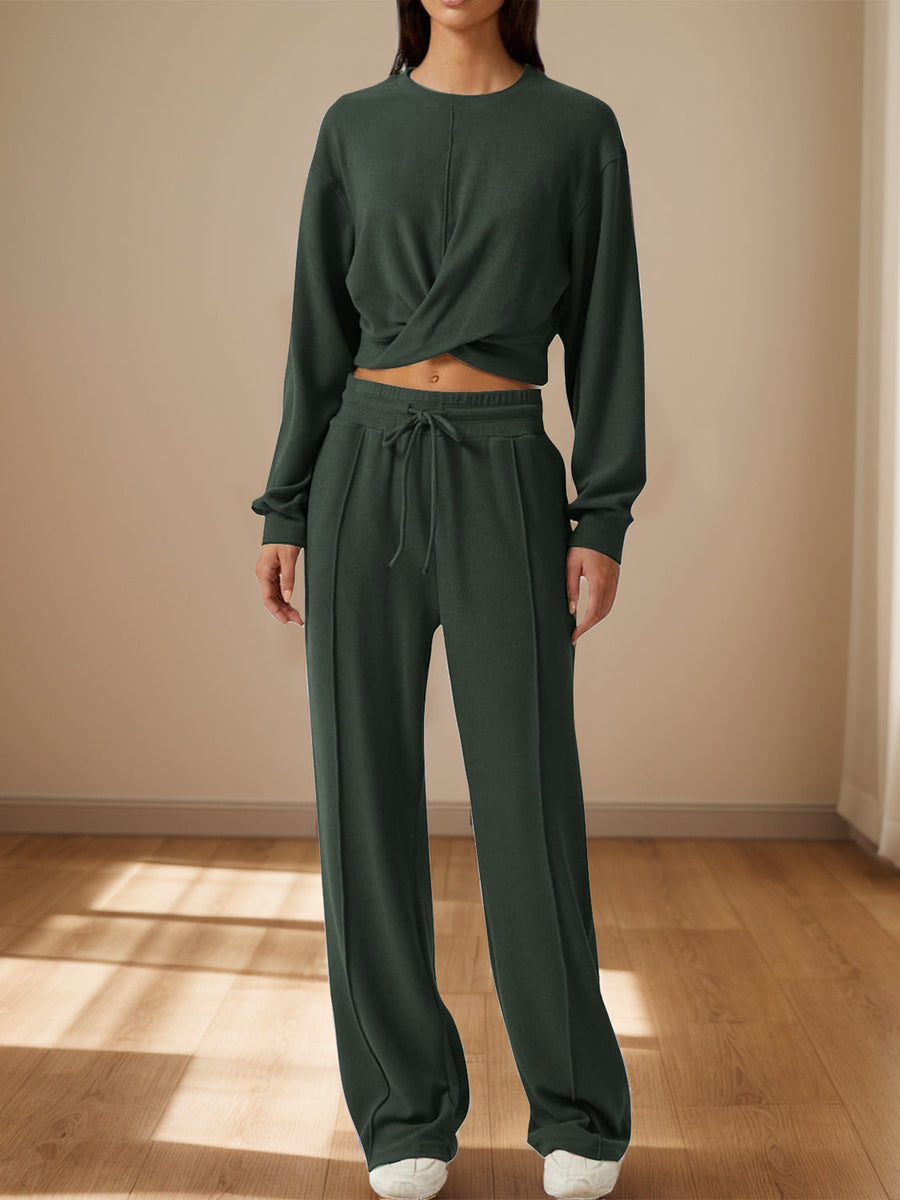Army green knit lounge set with a cross-front crop top and wide-leg pants.