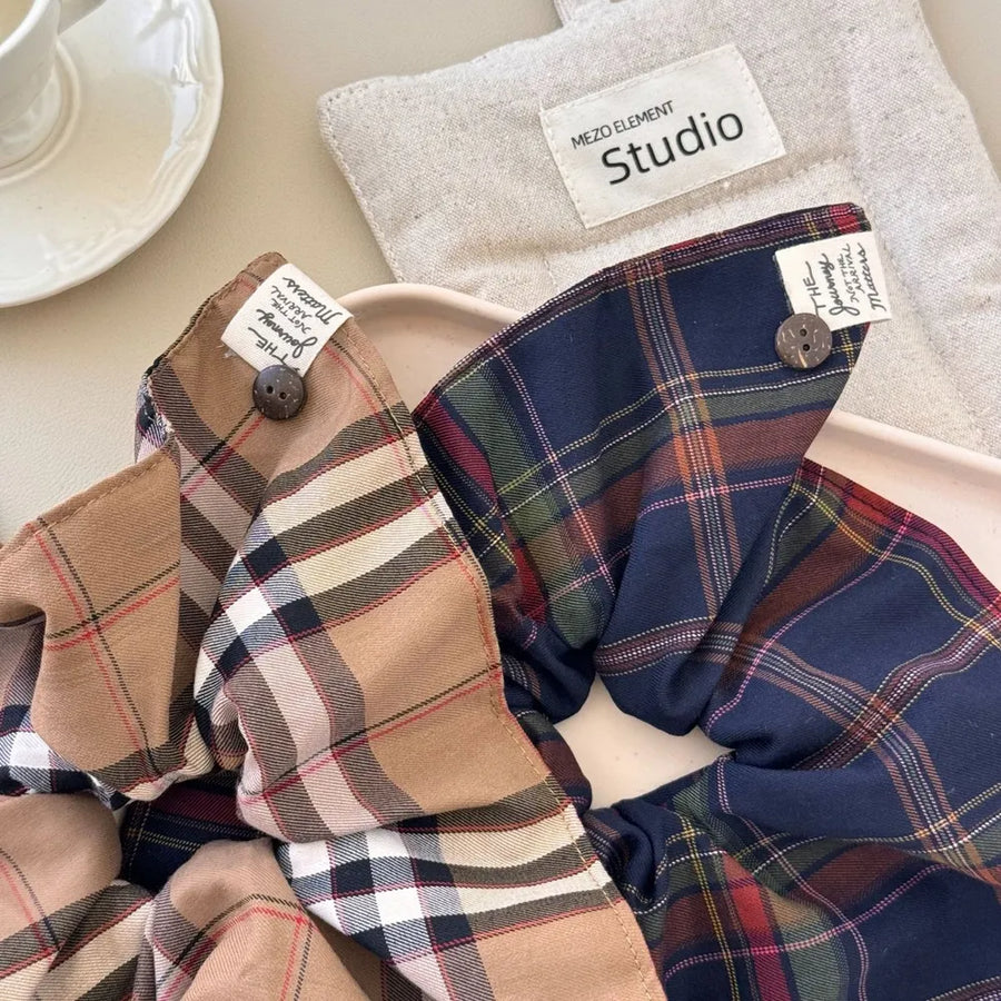 Plaid bow-tie scrunchie with button detail in Indigo and Camel colors