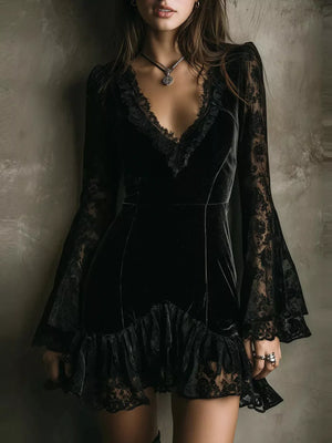 mini dress in black featuring lace trim and fitted fit