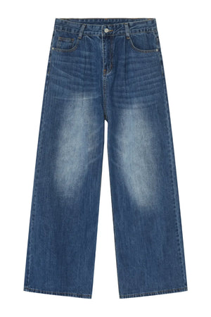 Pleated-front wide-leg denim trousers in peacock blue with a faded wash.