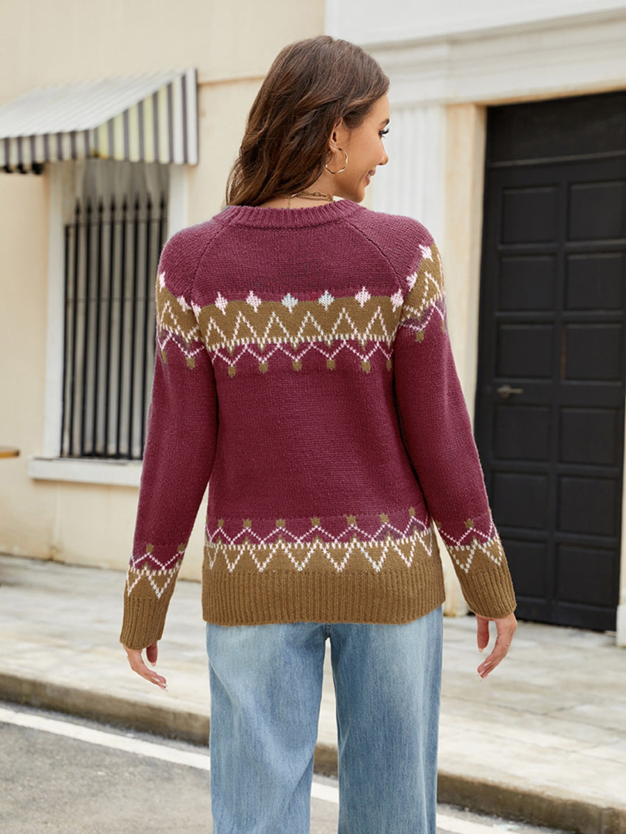 Fair Isle yoke knit sweater in burgundy with brown and white geometric pattern.