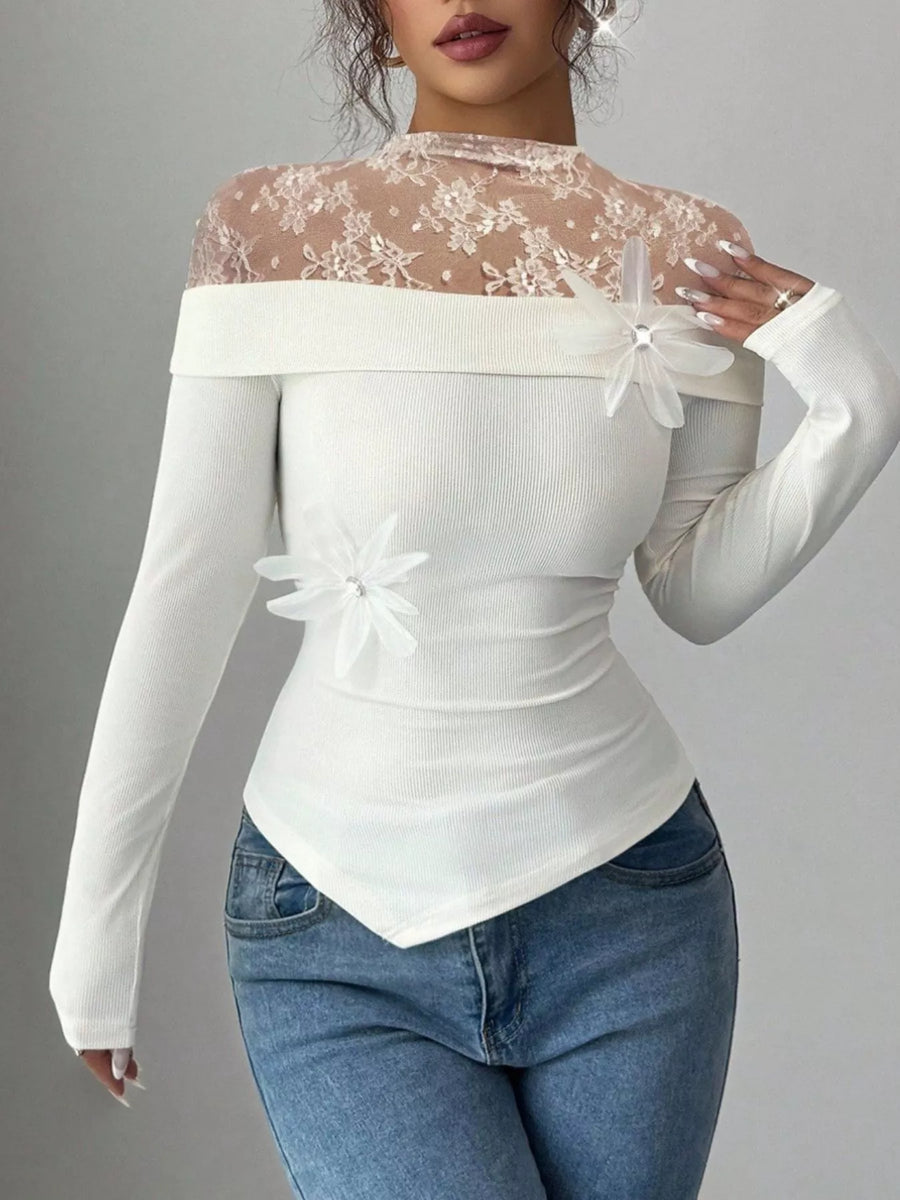 White lace detail bodysuit with long sleeves and floral embellishments.