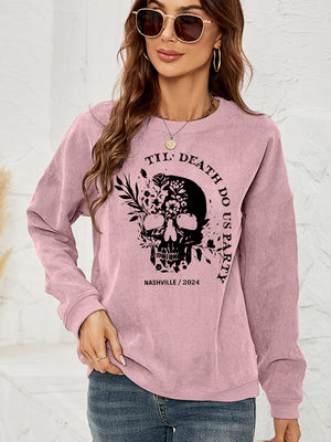 Dusty Pink corduroy sweatshirt with a black floral skull graphic and text.