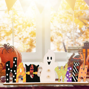 Halloween word block trio with ghost, pumpkin, and spider decor.
