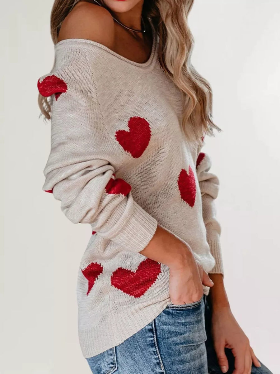 100% polyester Care instructions: Machine wash cold v-neck sweater in White with relaxed silhouette