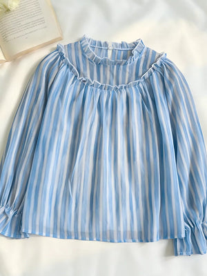 light blue blouse with hip-length and pullover