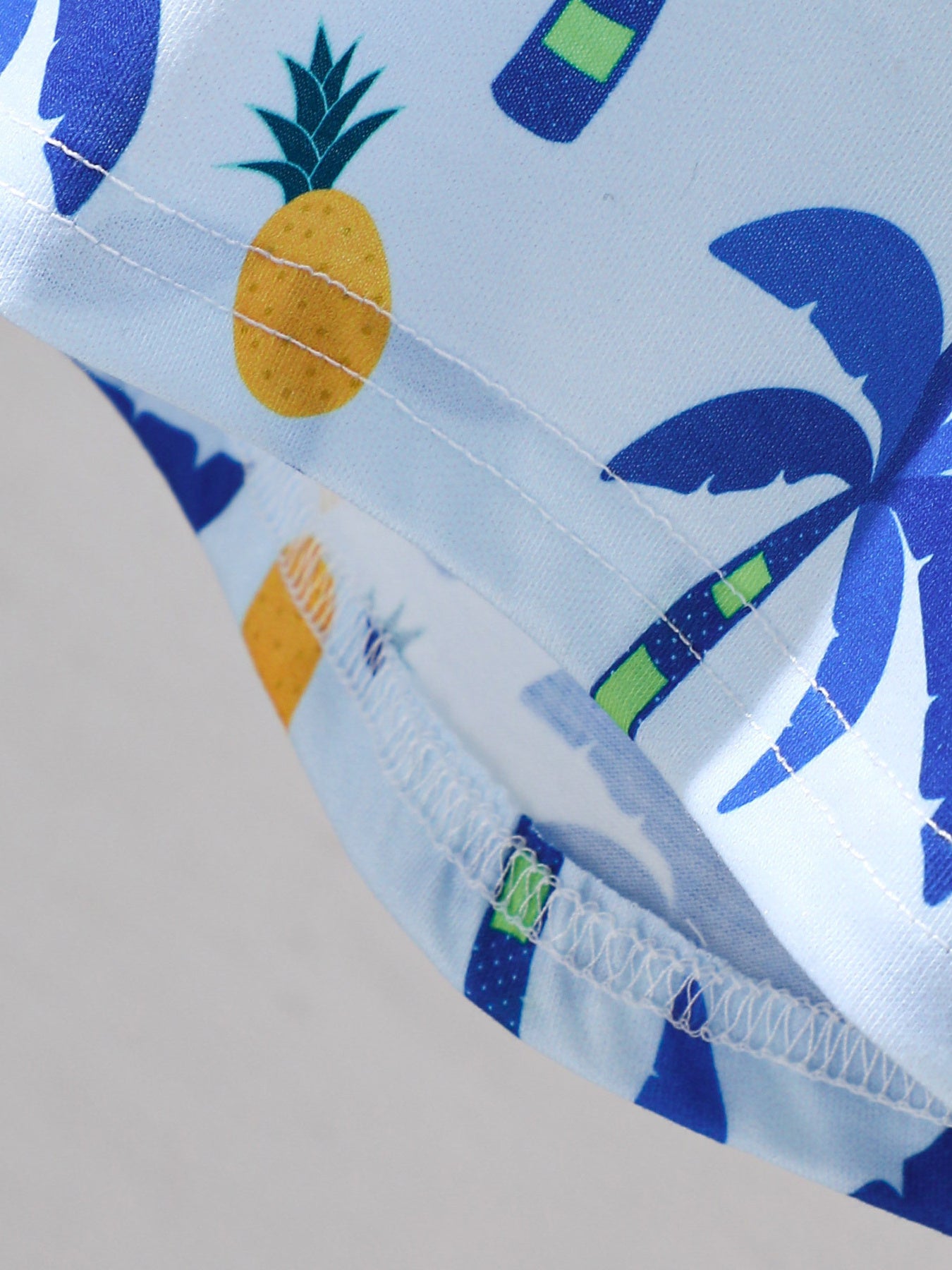 Baby cotton tee and shorts set with tropical pineapple and palm tree print.