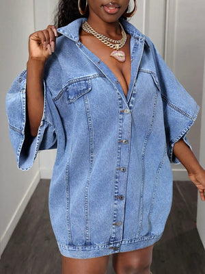 Oversized denim batwing dress in sky blue with button front and wide sleeves.