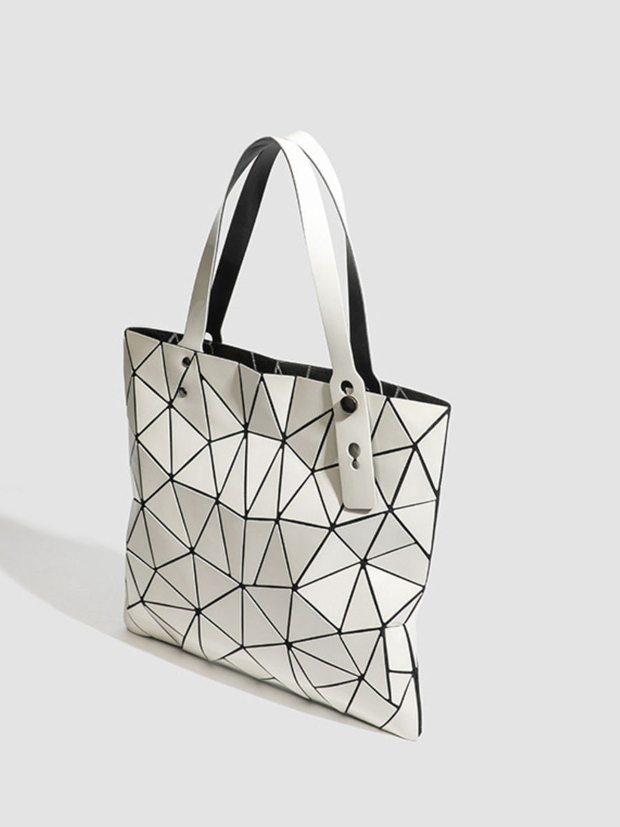 White handbag with snap and geometric
