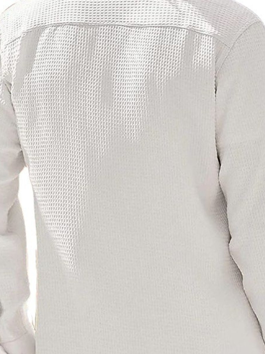 Men's white waffle knit button-up shirt with long sleeves.