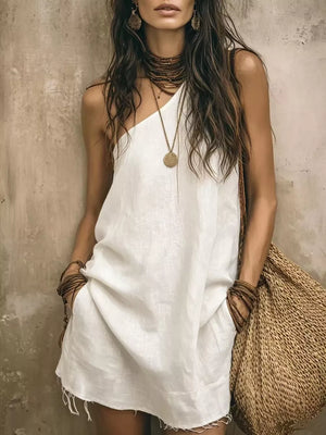 mini dress in white featuring raw hem and A-line fit