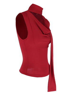 Red cowl neck cami top with draped detailing and a tie accent.