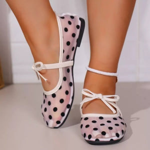 ivory flats featuring round toe and polka dot